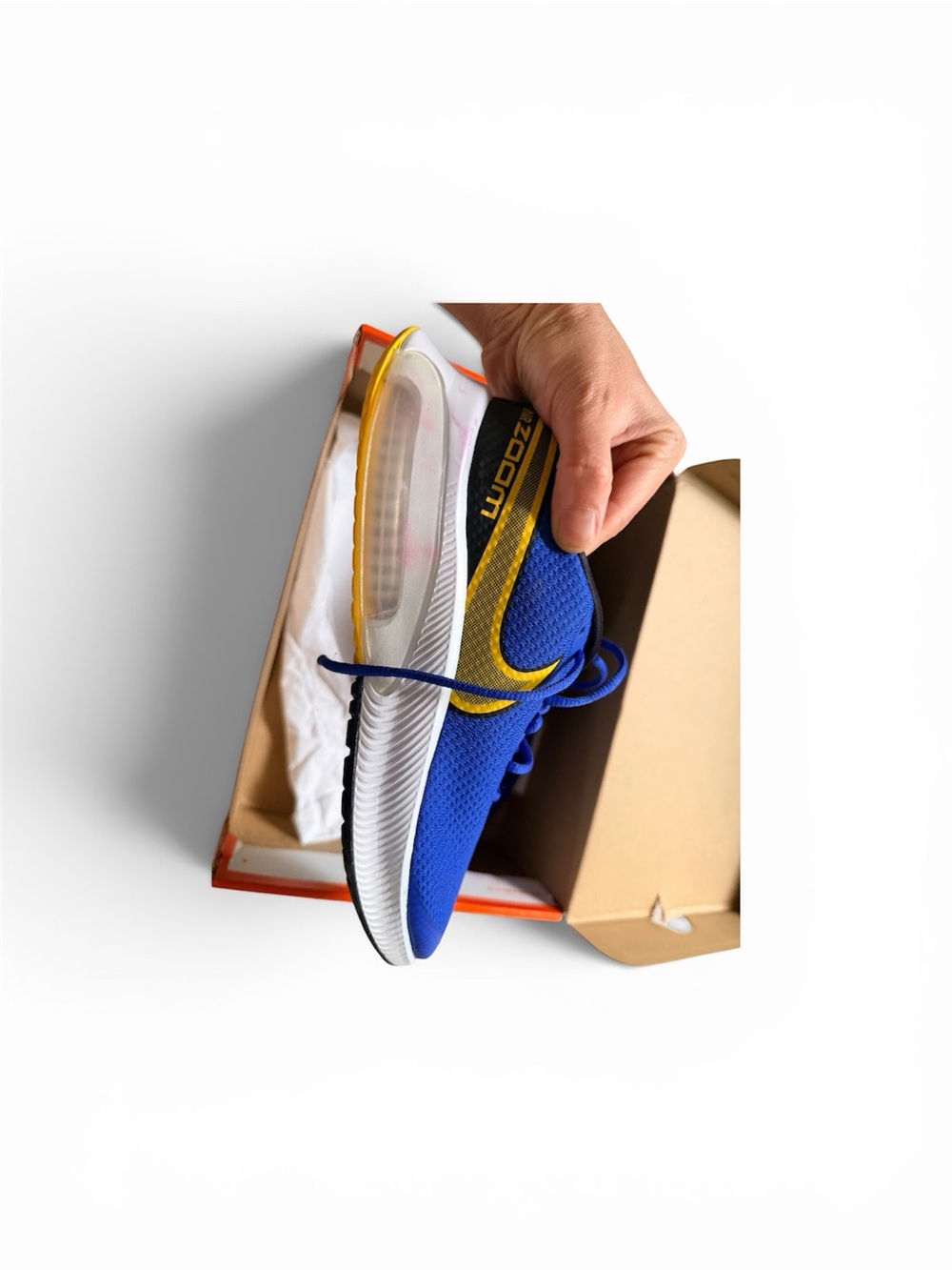 Nike Blue Running Shoe with Yellow Swoosh